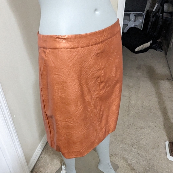 Topshop Dresses & Skirts - Topshop size 8 faux leather skirt camel in color